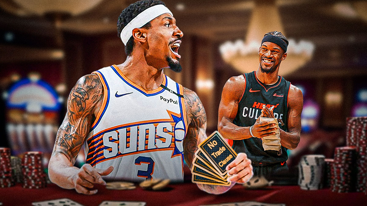Suns guard Bradley Beal holding a deck of cards. The deck of cards all say the phrase "No Trade Clause" on them, with Miami Heat forward Jimmy Butler smiling in the background.