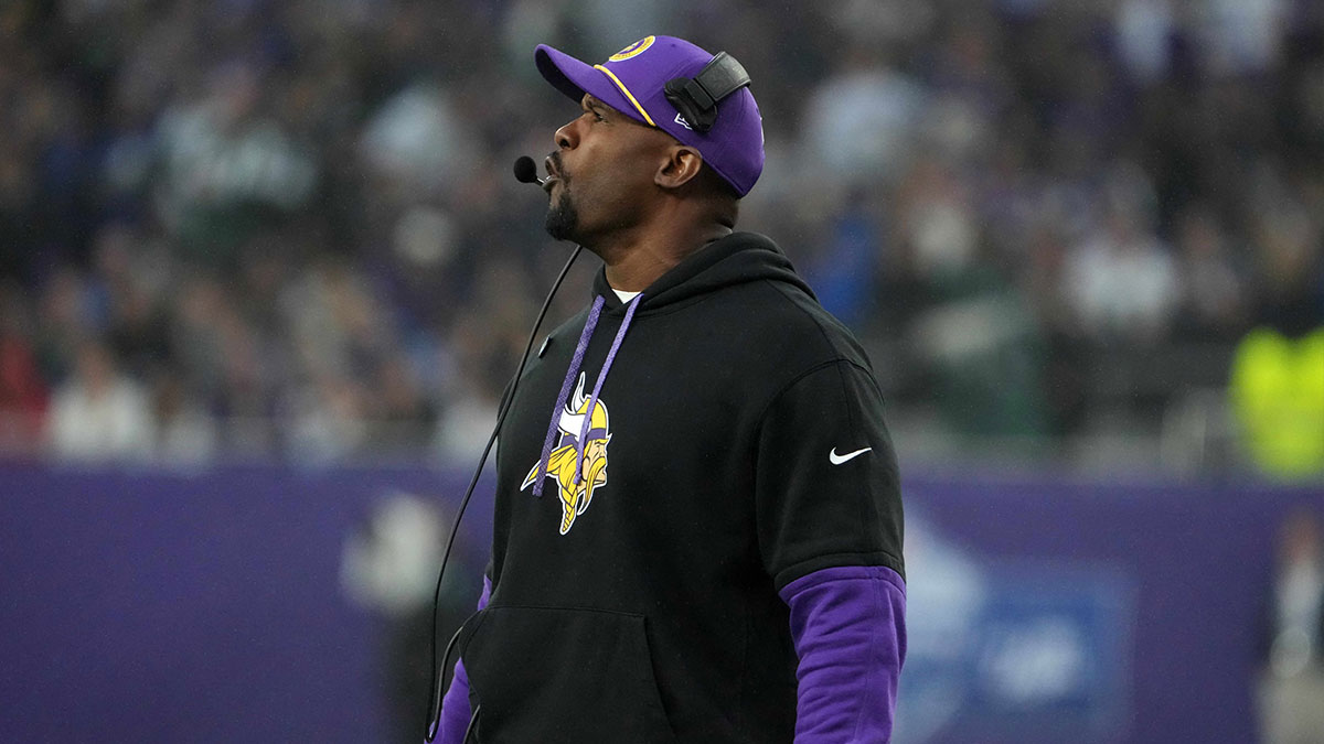 Minnesota Vikings defensive coordinator Brian Flores watches from the sidelines against the New York Jets in the second half at Tottenham Hotspur Stadium. 