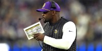 Minnesota Vikings defensive coordinator Brian Flores watches from the sidelines against the Los Angeles Rams in the first half at SoFi Stadium.