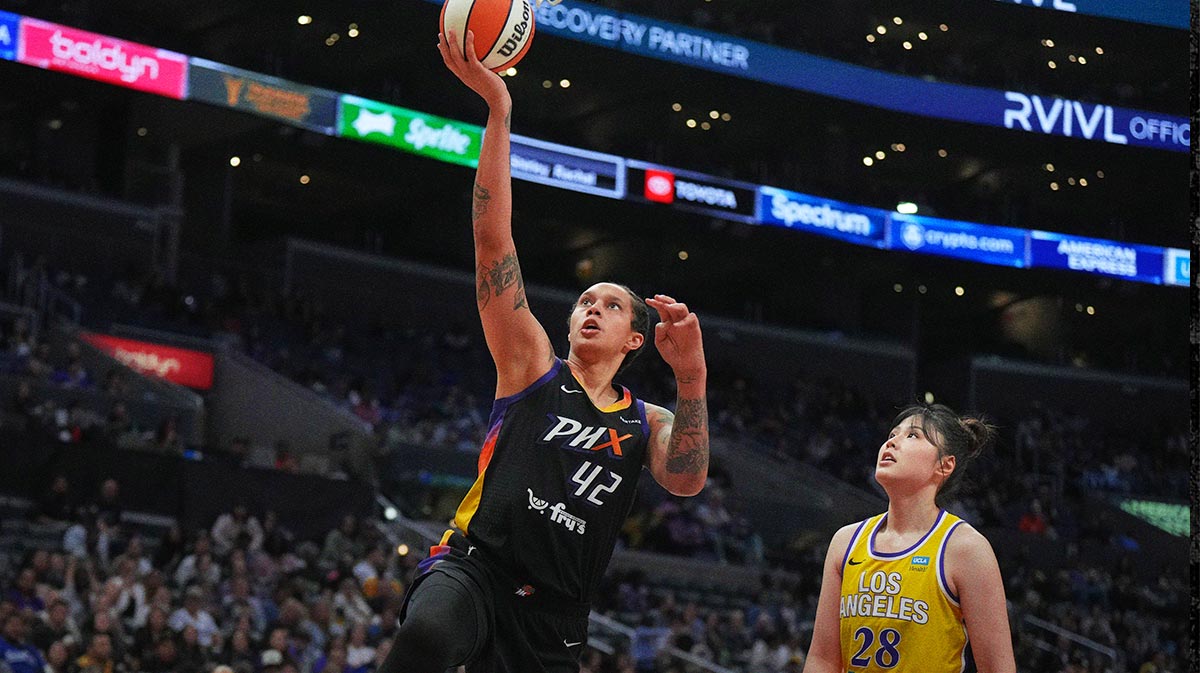 Phoenix Mercury center Brittney Griner (42) shoots the ball against LA Sparks center Li Yueru (28) in the first half at Crypto.com Arena.