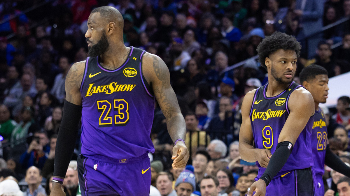 Los Angeles Lebron James (23) and guard Bronny James (9) view during the third quarter against Filadelphia 76ers in Wells Fargo Center. 