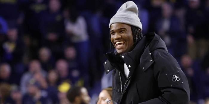 Michigan Wolverines quarterback Bryce Underwood participates in a t-shirt toss during a time out in the second half against the Penn State Nittany Lions at Crisler Center.
