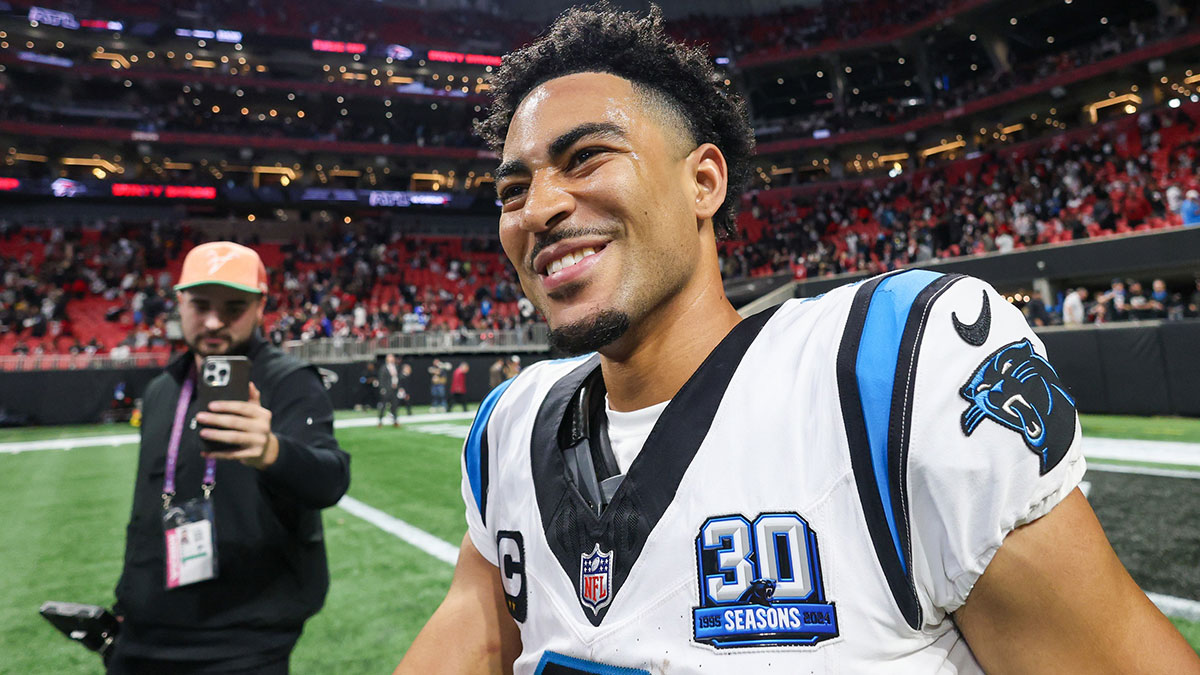 Carolina Panthers Quarterback Brice Young (9) celebrates after winning the Atlanta Falcons in the extension at the Mercedes-Benz stadium.