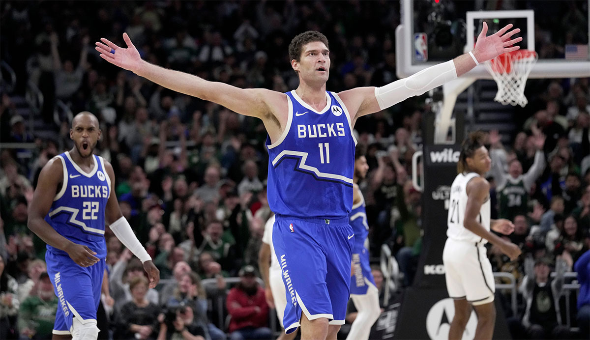 Bucks center Brook Lopez reacts after a draining a three-pointer during the first half against the Nets on Thursday night at Fiserv Form