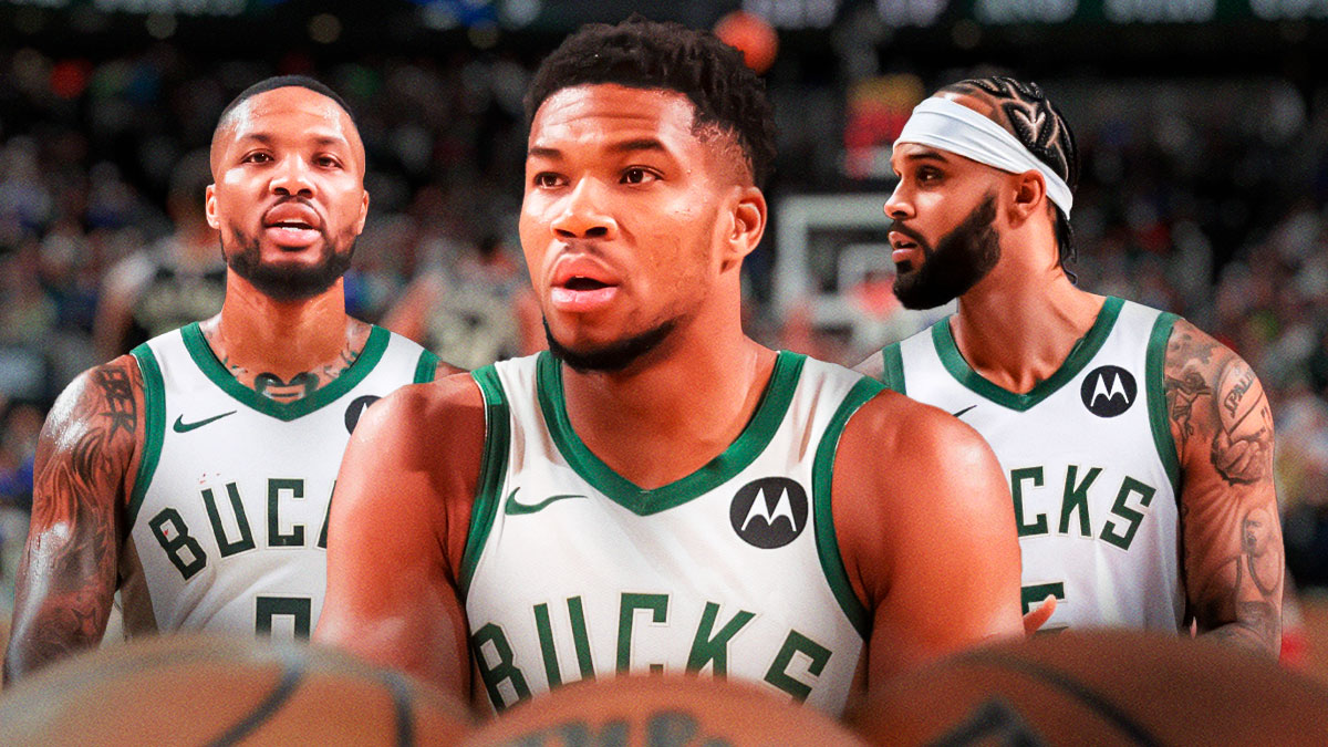 Milwaukee Bucks star Giannis Antetkounmpo in the middle of Damian Lillard and Gary Trent Jr. in front of Fiserv Fourm.