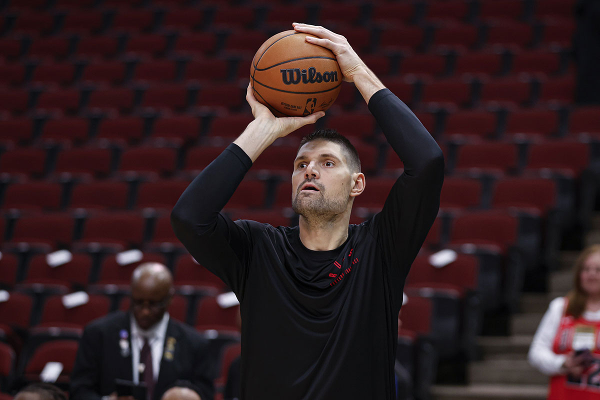 Chicago Bulls center Nikola Vucevic (9) warms up before a basketball game against the Boston Celtics at United Center.