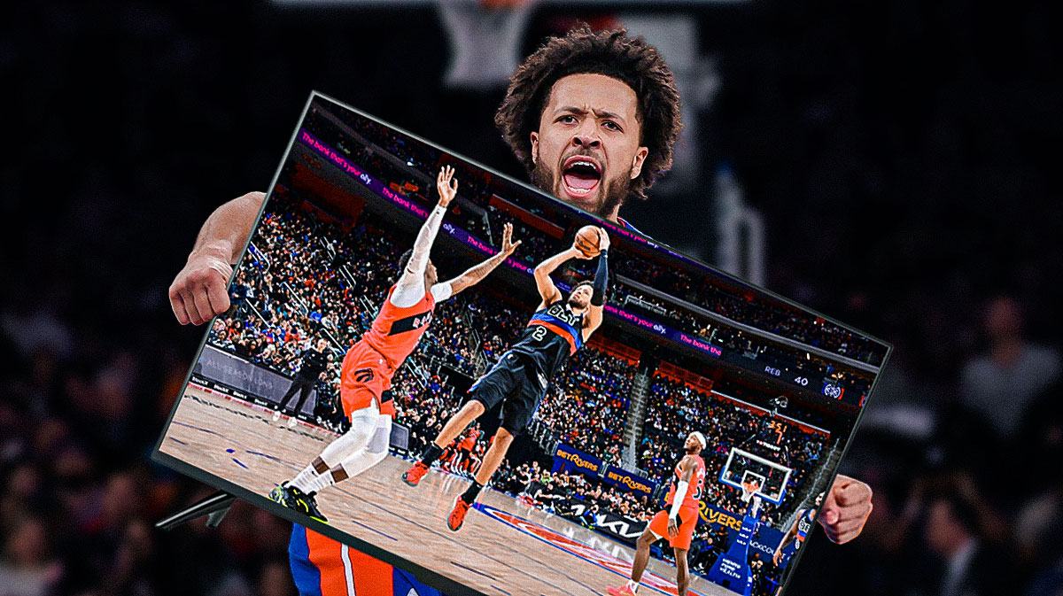 Pistons' Cade Cunningham holding a TV, with a picture of him in action on the TV