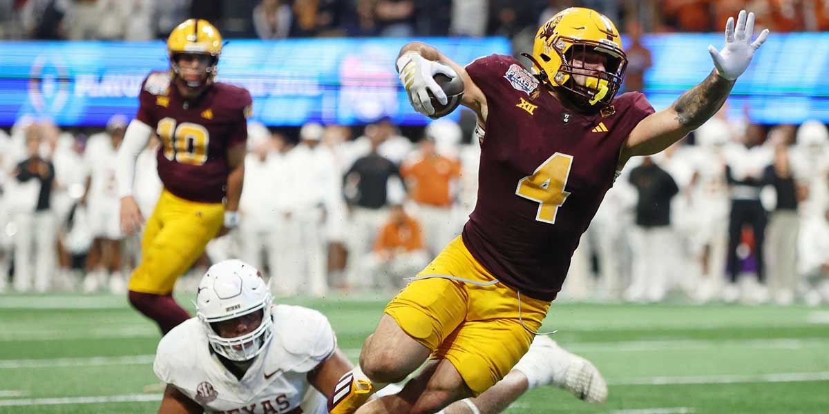 Jan 1, 2025; Atlanta, GA, USA; Arizona State Sun Devils running back Cam Skattebo (4) runs with the ball for a touchdown against the Texas Longhorns during the second half of the Peach Bowl at Mercedes-Benz Stadium. Mandatory Credit: Brett Davis-Imagn Images