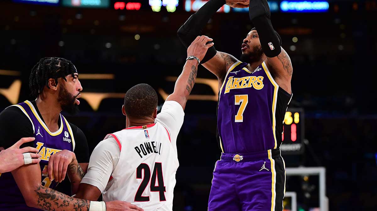 Los Angeles Lakers forward Carmelo Anthony (7) shoots against Portland Trail Blazers forward Norman Powell (24) during the second half at Crypto.com Arena.