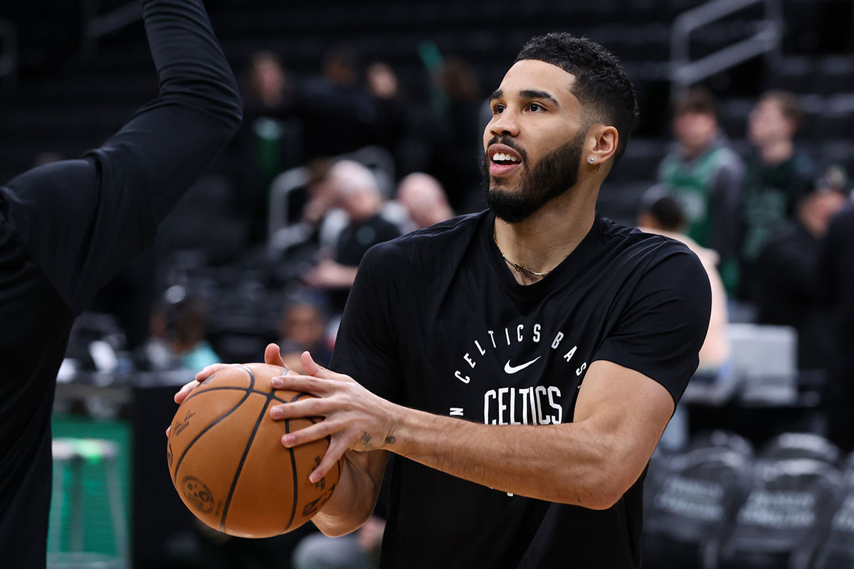 Boston Celtics forward Jayson Tatum (0) warms up before the game against the New Orleans Pelicans at TD Garden.