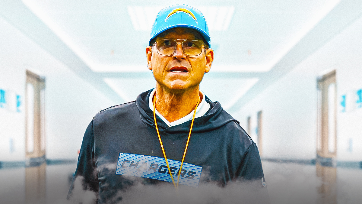 Jim Harbaugh looks sad on hospital bed