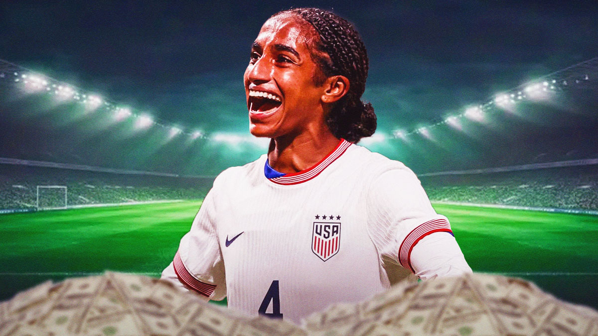United States Women’s National Soccer team player Naomi Girma on a soccer field, surrounded by piles of dollar bills