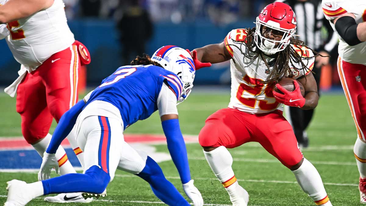 Kansas City Chiefs running back Kareem Hunt (29) prepares for contact by Buffalo Bills safety Damar Hamlin (3) in the first quarter at Highmark Stadium. 