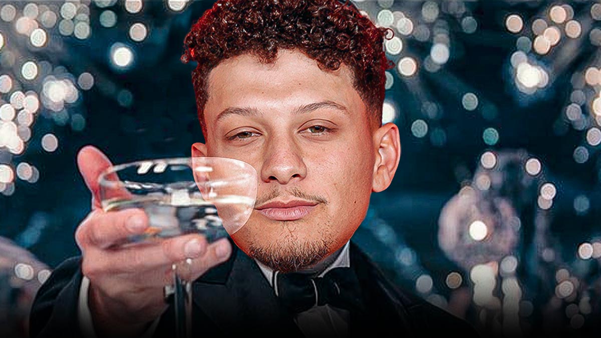 Chiefs quarterback Patrick Mahomes raising a glass in a toast.