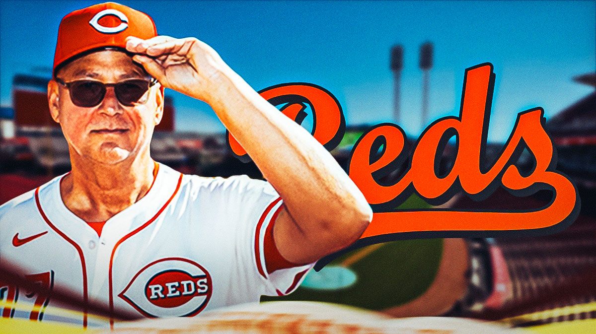 Terry Francona next to a Reds jersey