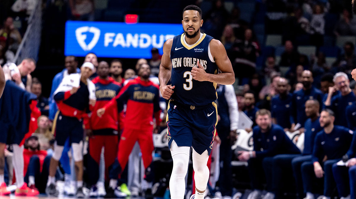 New Orleans Pelicans guard CJ McCollum (3) reacts after scoring his 50th point against the Washington Wizards during the second half at the Smoothie King Center.