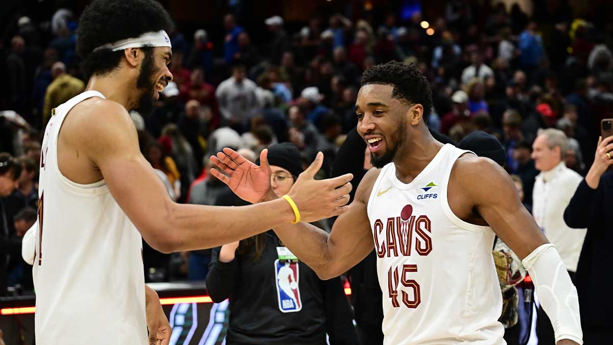 Cleveland Cavaliers guard Donovan Mitchell (45) celebrates with center Jarrett Allen (31) after the Cavaliers beat the Oklahoma City Thunder at Rockets Mortgage Fieldhouse.