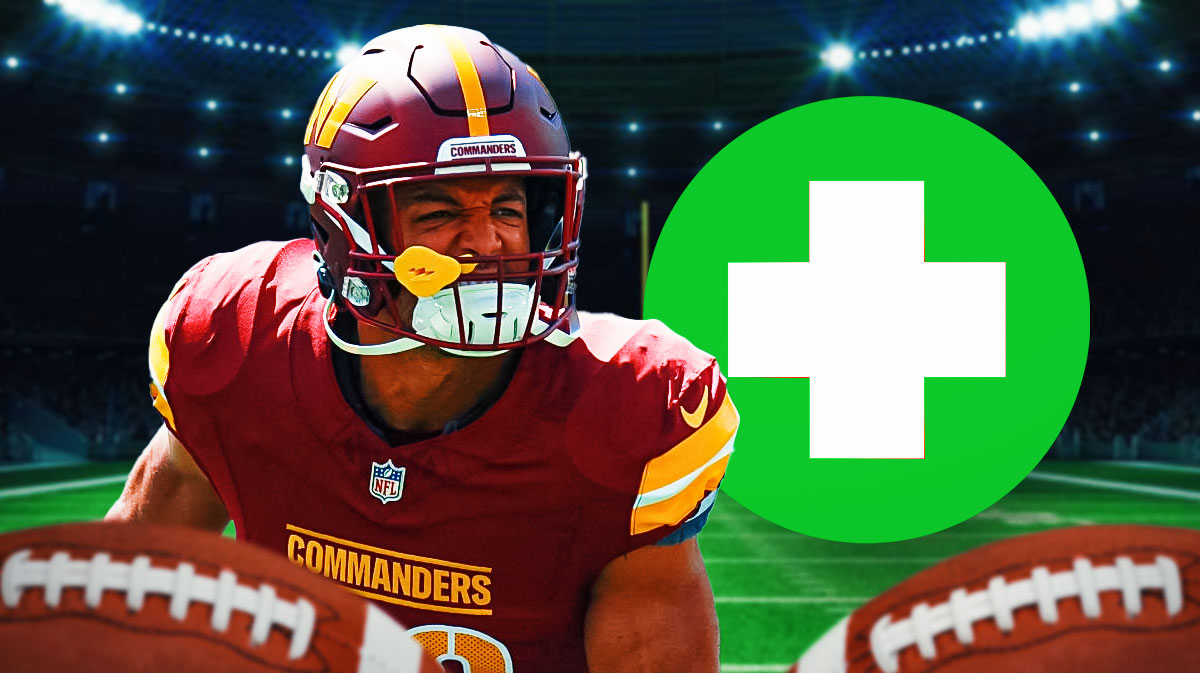 Commanders Austin Ekeler with green medical cross