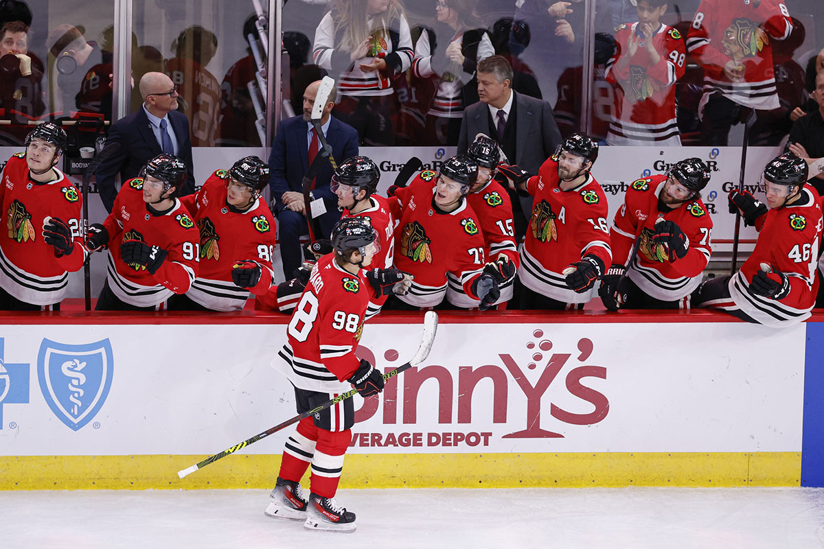 Chicago Blackhawks center Connor Bedard (98) celebrates with teammates after scoring against the Colorado Avalanche during the third period at United Center.