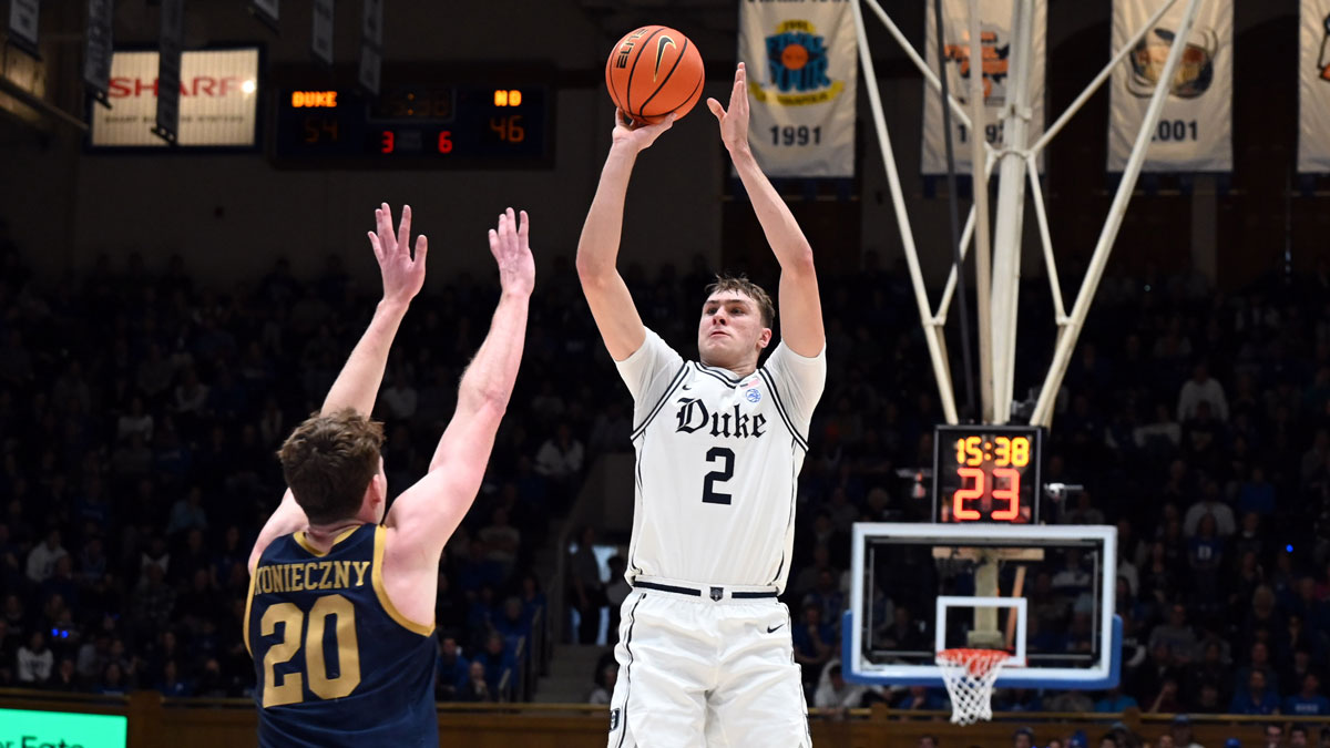 Jan 11, 2025; Durham, North Carolina, USA; Duke Blue Devils forward Cooper Flagg (2) shoots over Notre Dame Fighting Irish guard JR Konieczny (20) during the first half at Cameron Indoor Stadium.