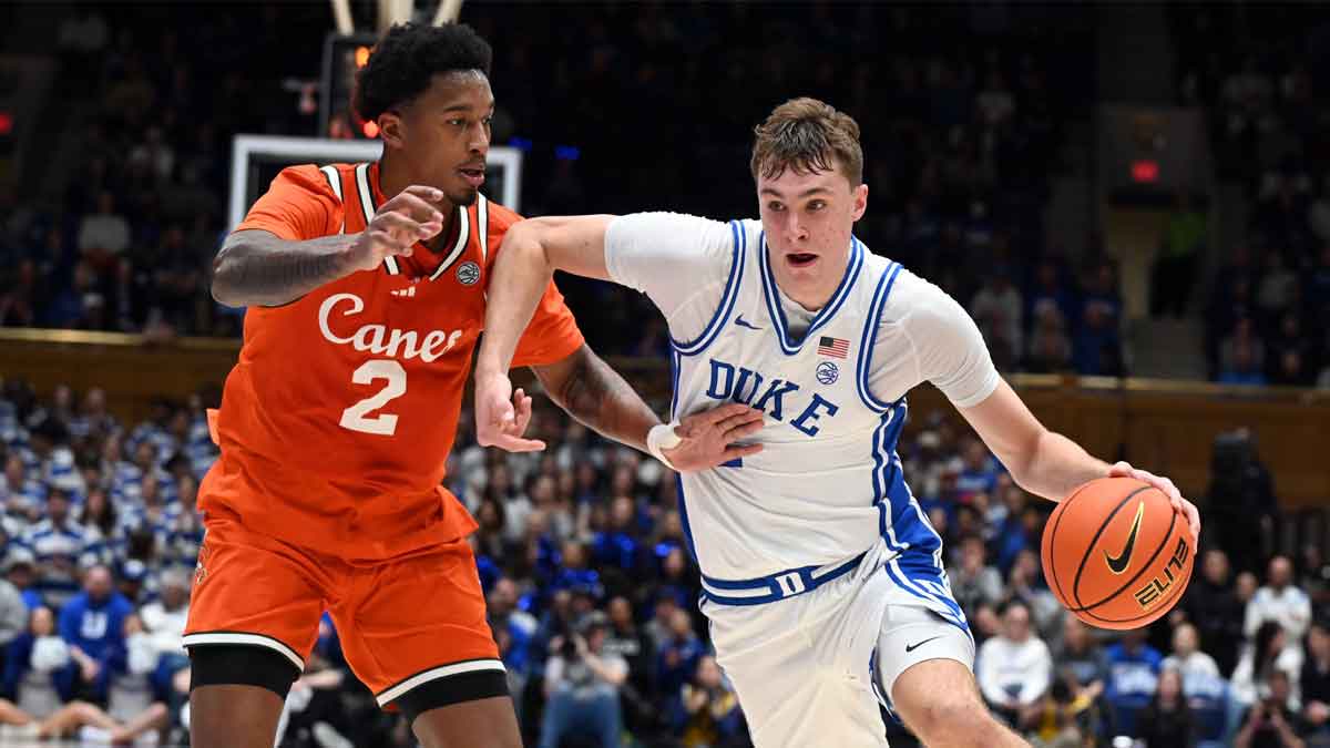 Duke Blue Devils forward Cooper Flagg (2) drives to the basket as Miami Hurricanes forward Brandon Johnson (2) defends during the second half at Cameron Indoor Stadium.