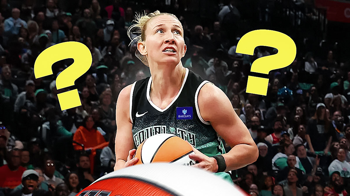 Courtney Vandersloot (Liberty) front and center, handling the ball. Arena interior background and ? emojis