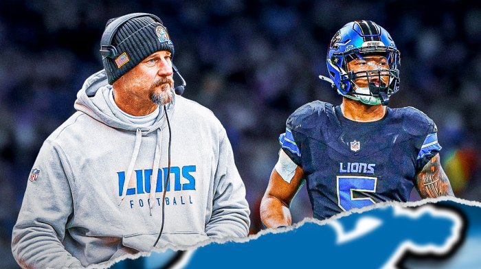 Dan Campbell smiles next to David Montgomery