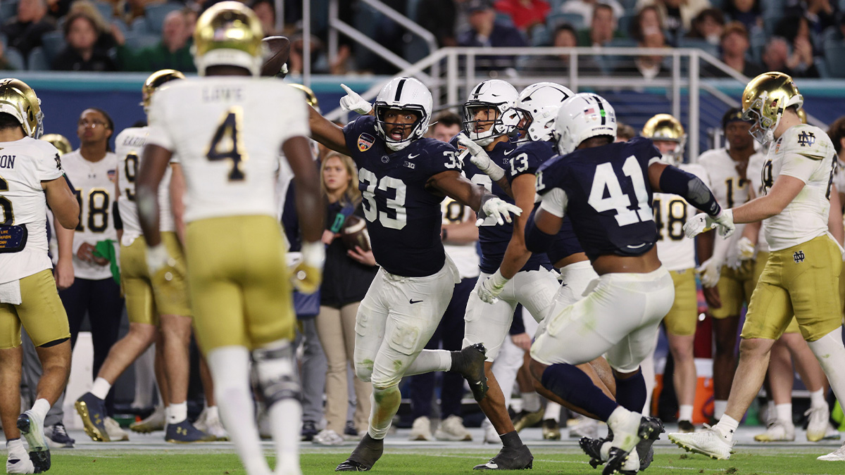 Penn State Nittany Lions defensive end Dani Dennis-Sutton (33) intercepts the ball in the second half against the Notre Dame Fighting Irish in the Orange Bowl at Hard Rock Stadium.