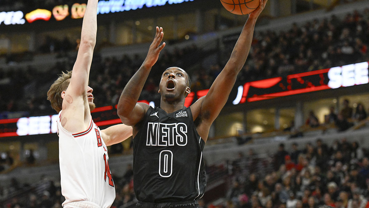 Brooklyn Nets forward Dariq Whitehead (0) shoots against Chicago Bulls forward Matas Buzelis (14) during the second half at the United Center.