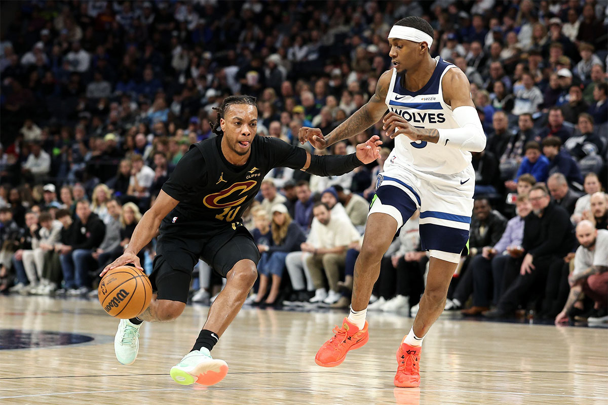 Cleveland Cavaliers guard Darius Garland (10) works around Minnesota Timberwolves forward Jaden McDaniels (3) during the third quarter at Target Center.