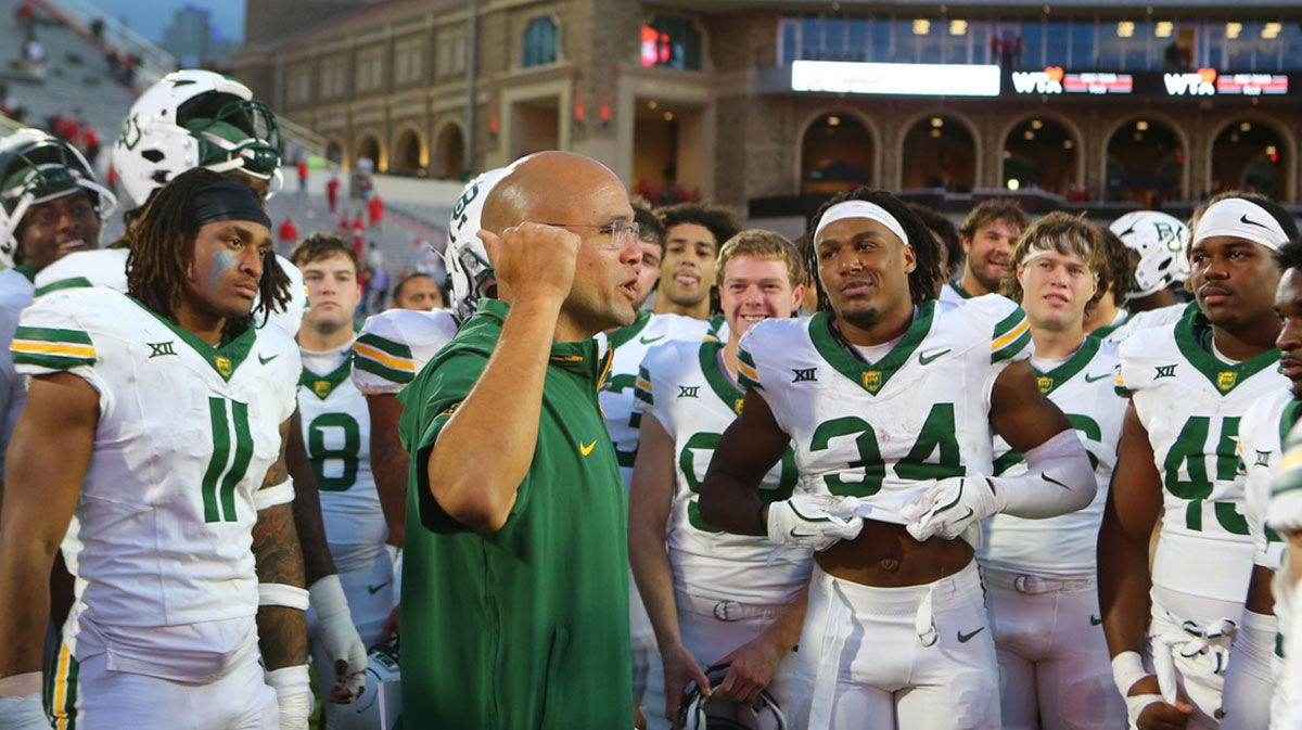 Oct 19, 2024; Lubbock, Texas, USA; Baylor Bears head coach Dave Aranda visits with his team after a game against the Texas Tech Red Raiders at Jones AT&T Stadium and Cody Campbell Field. Mandatory Credit: Michael C. Johnson-Imagn Images