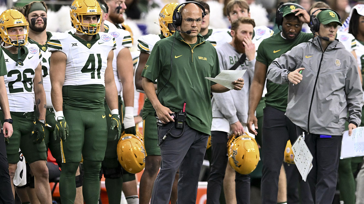 Dec 31, 2024; Houston, TX, USA; Baylor Bears head coach Dave Aranda looks on during the first half against the LSU Tigers at NRG Stadium. Mandatory Credit: Maria Lysaker-Imagn Images