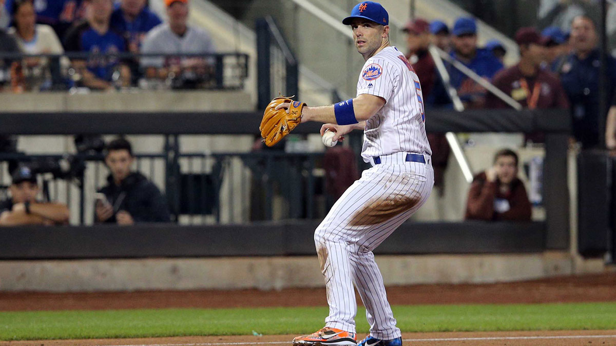 New York Mets third baseman David Wright (5) fields a ground ball against the Miami Marlins during the second inning at Citi Field.