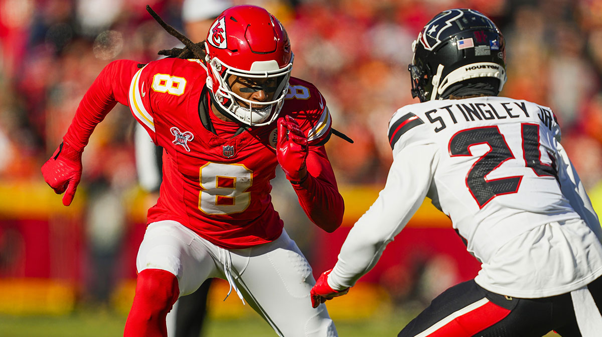 Kansas City Chiefs wide receiver DeAndre Hopkins (8) runs against Houston Texans cornerback Derek Stingley Jr. (24) during the first half at GEHA Field at Arrowhead Stadium.