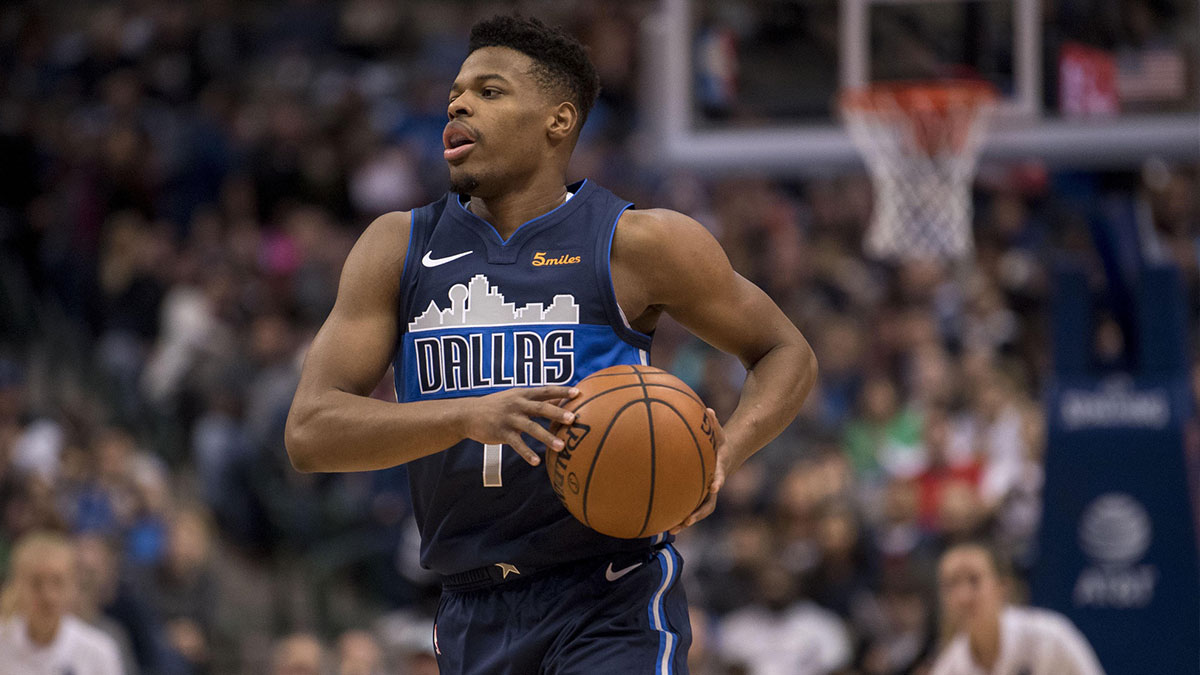 Dallas Mavericks guard Dennis Smith Jr. (1) brings the ball up court against the Oklahoma City Thunder during the first quarter at the American Airlines Center.