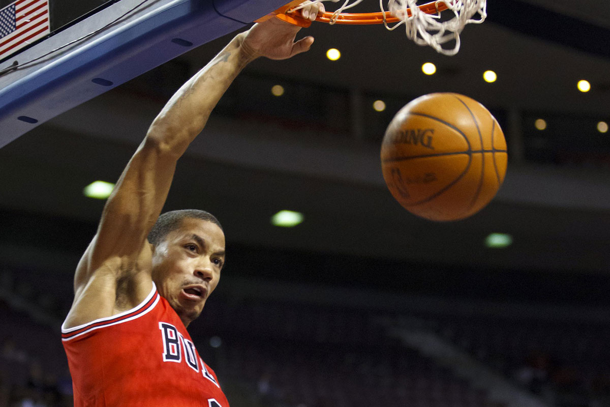 Chicago Bulls point guard Derrick Rose (1) dunks the ball in the first quarter against the Detroit Pistons at The Palace.