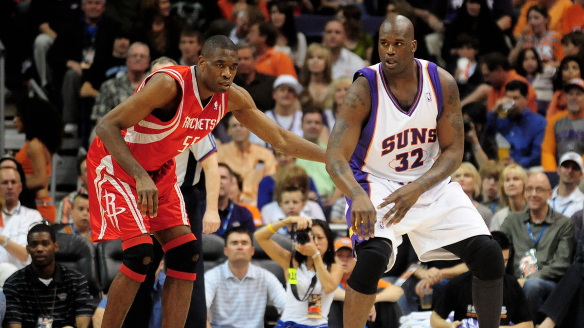 Phoenix Suns center (32) Shaquille O'Neal is defended by Houston Rockets center (55) Dikembe Mutombo at the US Airways Center.