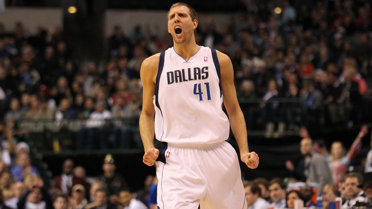 Dallas Mavericks forward Dirk Nowitzki (41) screams after hitting a three point basket in the fourth quarter against the New Jersey Nets at American Airlines Center. The Mavs beat Nets 102-89. 