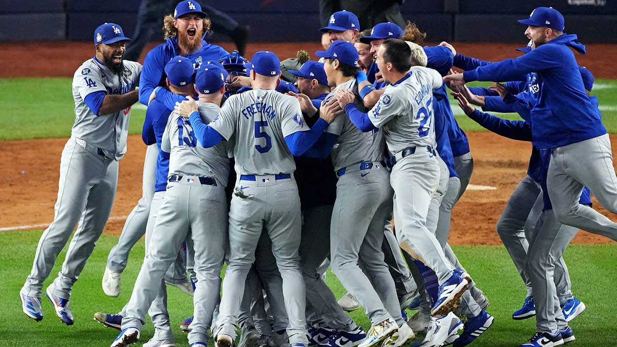 The Los Angeles Dodgers celebrate after beating the New York Yankees in Game 5 to win the World Series at Yankee Stadium.