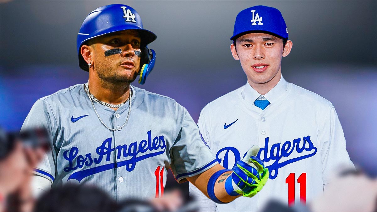 Roki Sasaki and Miguel Rojas beside each other both wearing Dodger gear and number 11.