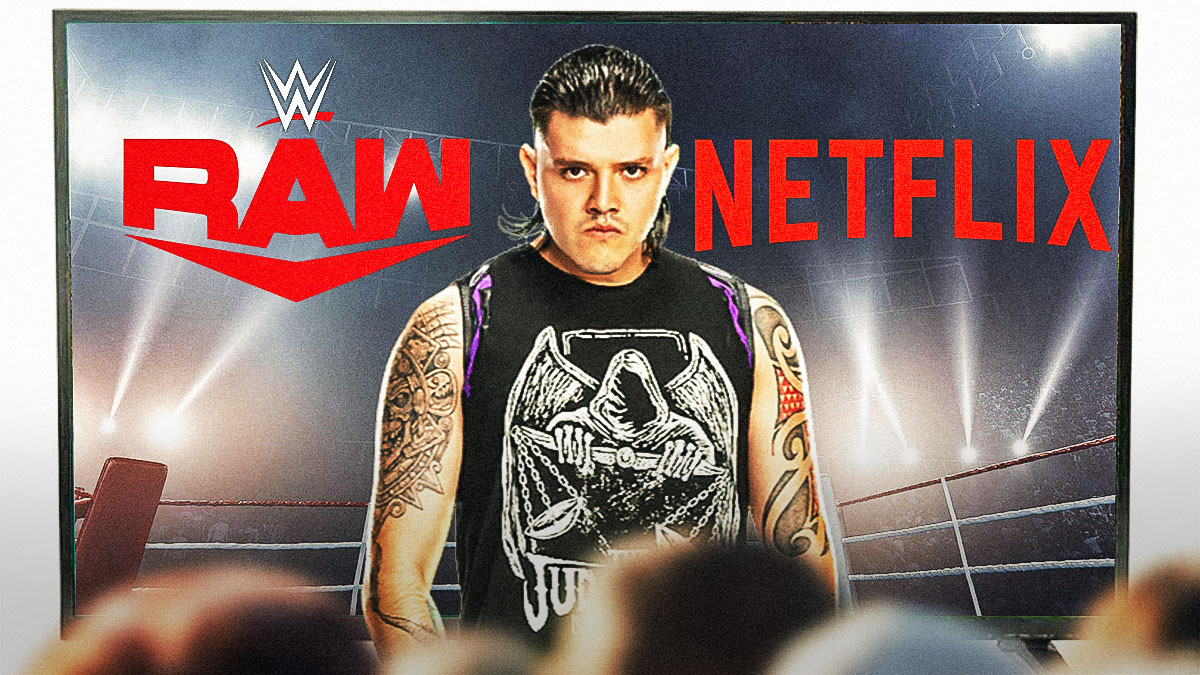 Dominik Mysterio in front of a Television with the RAW on Netflix logo on the screen.