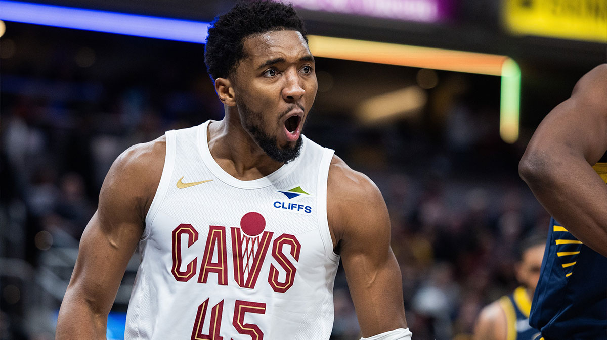 Cleveland Cavaliers guard Donovan Mitchell (45) reacts to a shot and a foul during the first half against the Indiana Pacers at Gainbridge Fieldhouse.