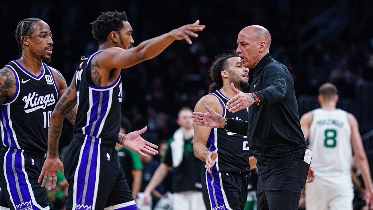 Sacramento Kings interim coach Doug Christie reacts with players during halftime against the Boston Celtics at TD Garden.