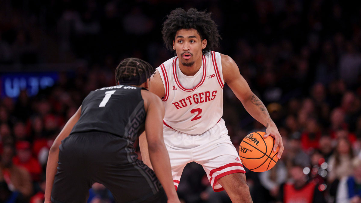 Rutgers Scarlet Knights guard Dylan Harper (2) dribbles as Michigan State Spartans guard Jeremy Fears Jr. (1) defends during the first half at Madison Square Garden.