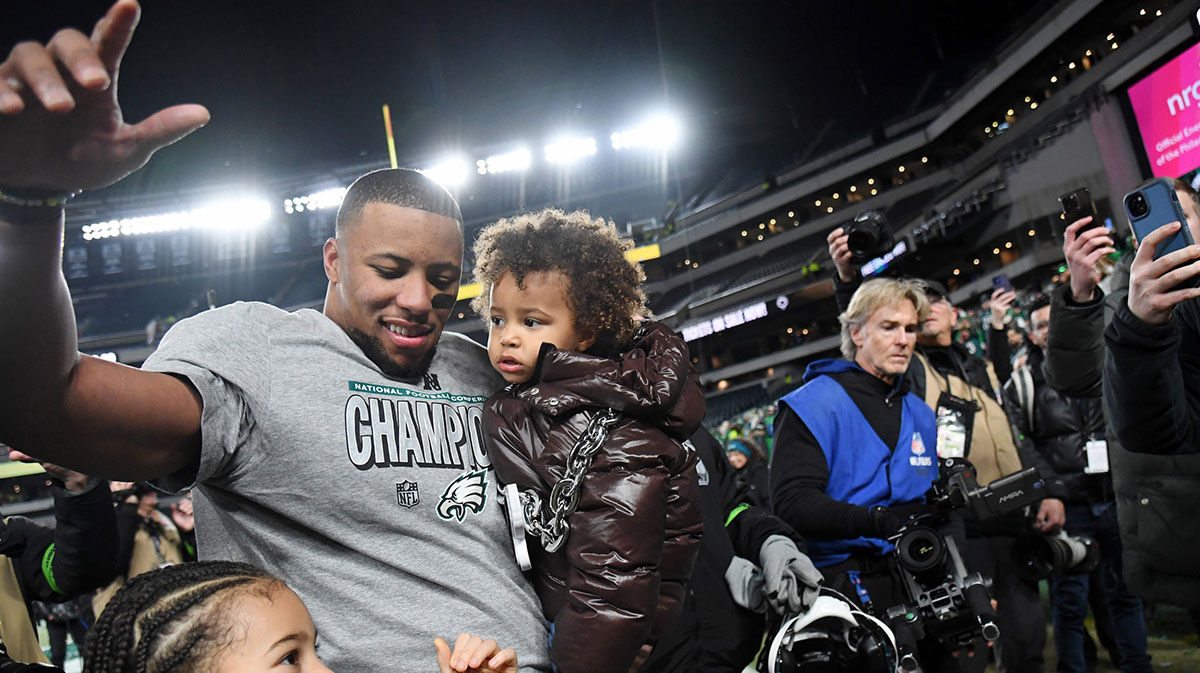 Philadelphia Eagles running back Saquon Barkley (26) celebrates after winning the NFC Championship game against the Washington Commanders at Lincoln Financial Field.