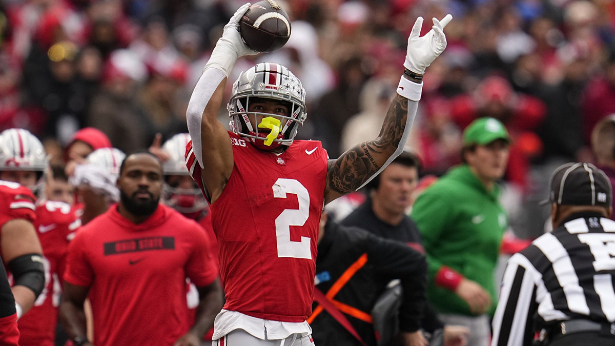 Ohio State Buckeyes wide receiver Emeka Egbuka (2) celebrates a first down catch during the second half of the NCAA football game against the Indiana Hoosiers at Ohio Stadium in Columbus on Saturday, Nov. 23, 2024. Ohio State won 38-15.