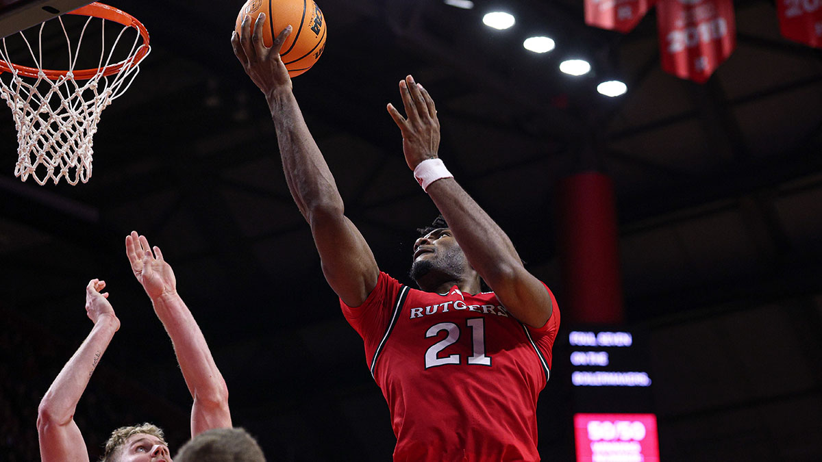 Rutgers Scarlet Knights center Emmanuel Ogbole (21) lays the ball up during the second half against the Purdue Boilermakers at Jersey Mike's Arena.