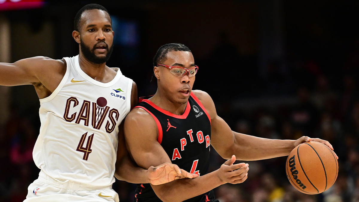 Toronto Raptors forward Scotty Barnes (4) drives to the basket against Cleveland Cavaliers forward Evan Mobley (4) during the second half at Rocket Mortgage FieldHouse.