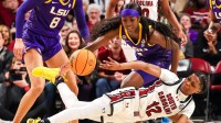 South Carolina Gamecocks guard MiLaysia Fulwiley (12) passes away from LSU Lady Tigers guard Flau'Jae Johnson (4) in the first half at Colonial Life Arena.
