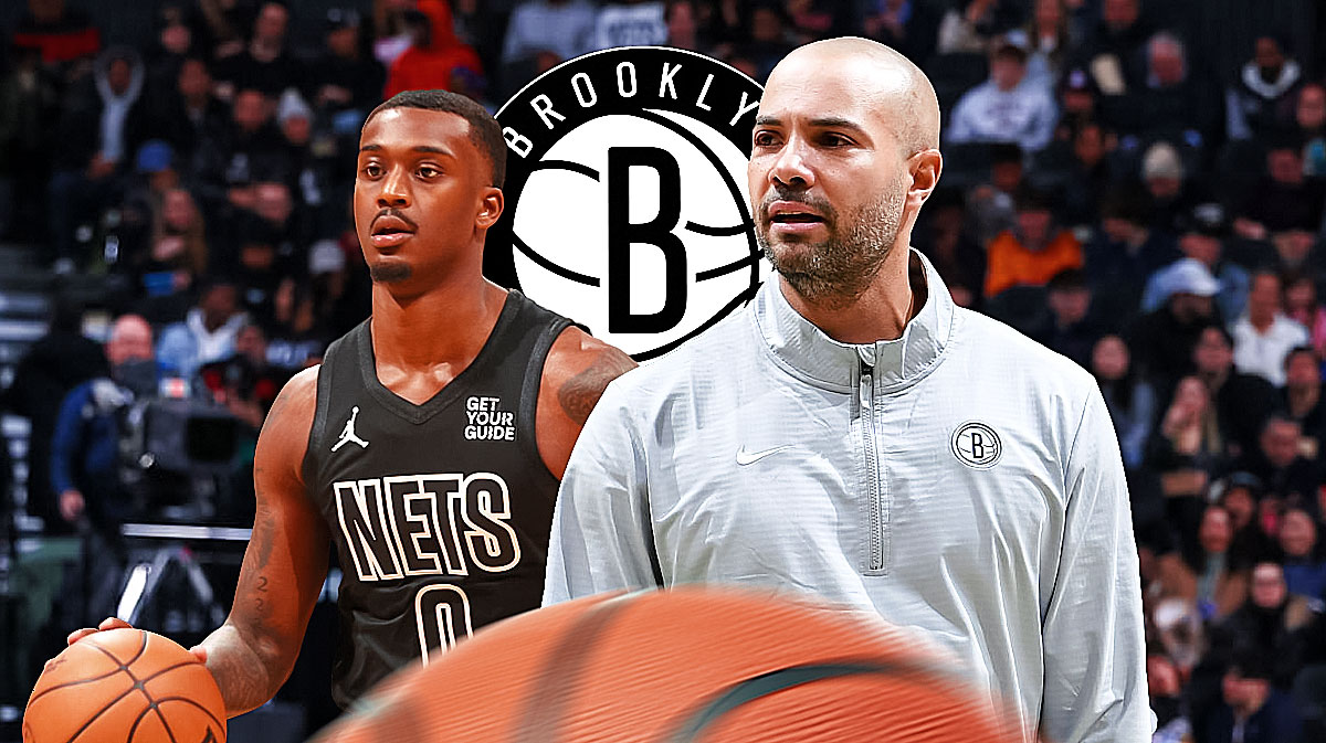 Dariq Whitehead and Jordi Fernandez with a Nets logo